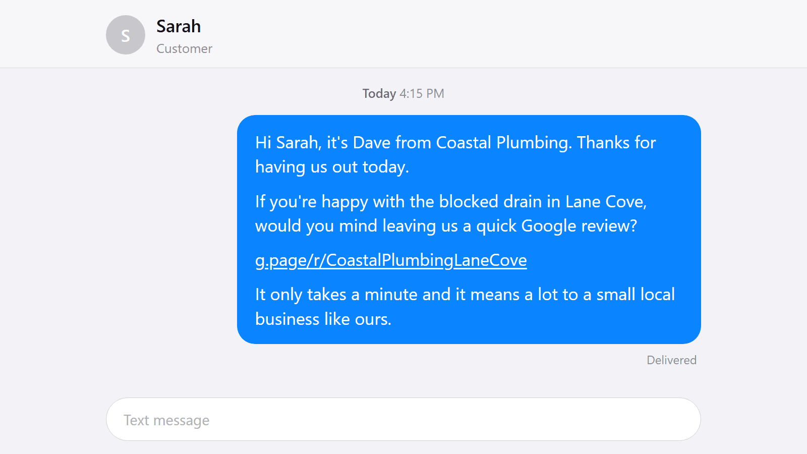 SMS review request on a phone after a tradie job, the core of a repeatable Google review system.